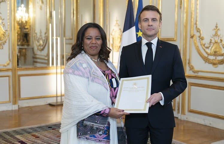 A picture of Presdent Macron of France with Ambassador of Ethiopia 